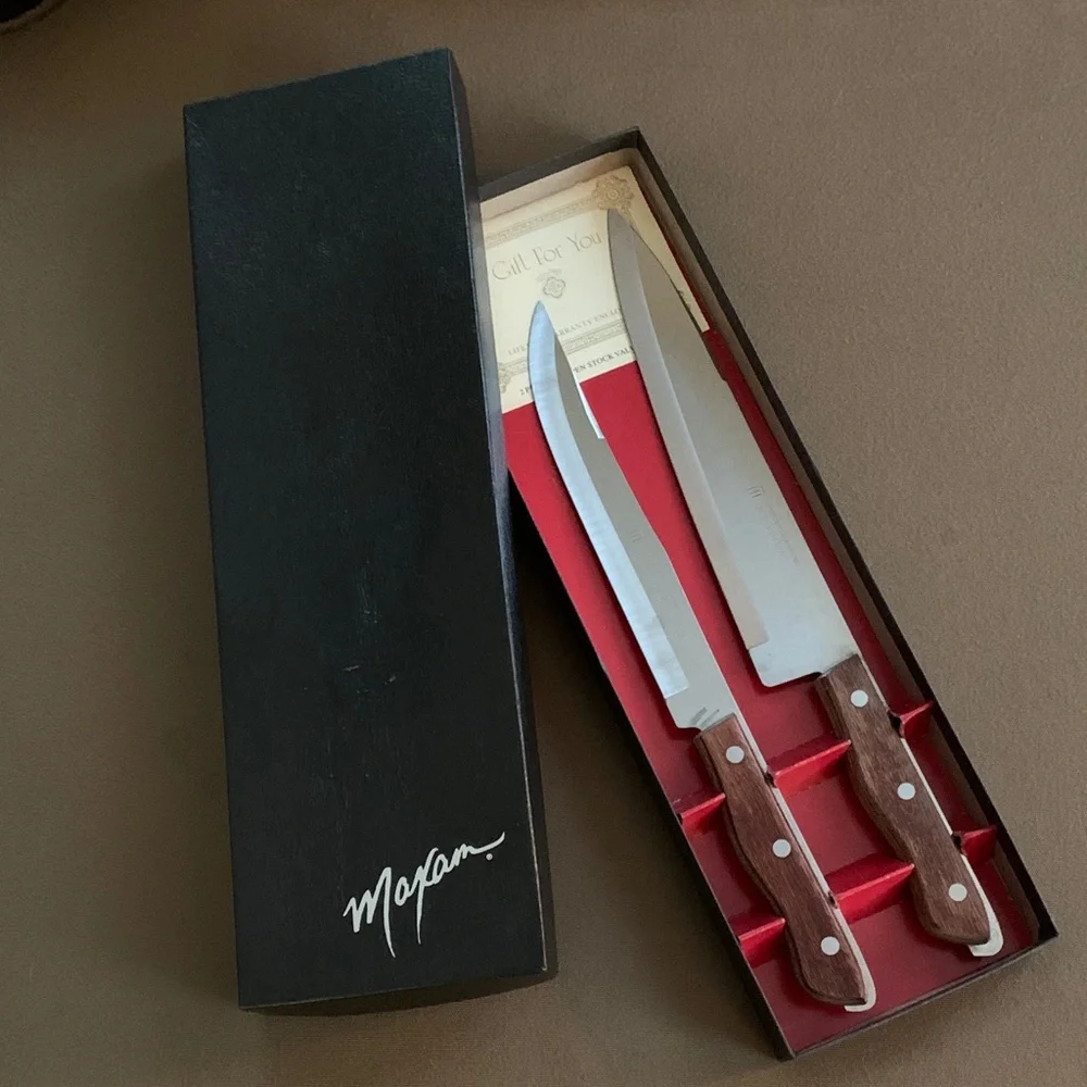 Set of Maxam carving knives in original box, blades approximately 6” & 8”